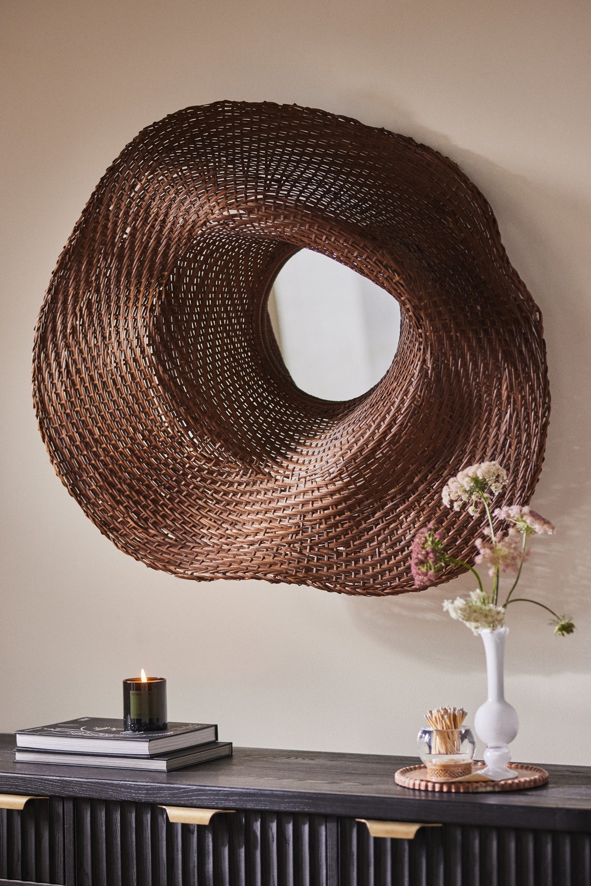 Askja Sculptural Woven Rattan Round Wall Mirror featured in the Wood & Woven Mirrors collection