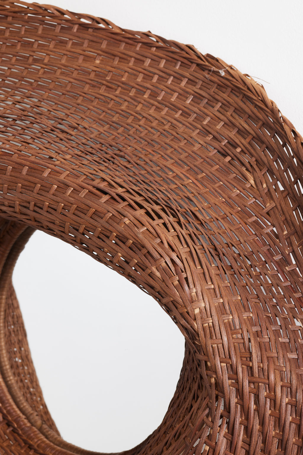 Askja Sculptural Woven Rattan Round Wall Mirror in Brown, product view 3